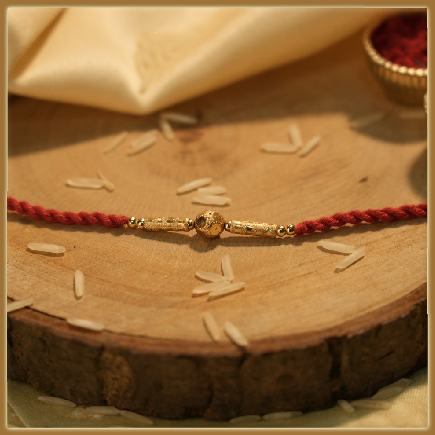Golden Fancy Rakhi With Elegant Look